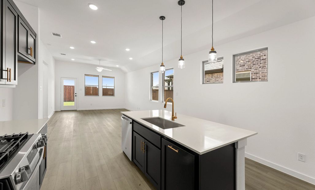 Open Kitchen-Living-Dining Room Representative Photo featuring the Noir Collection