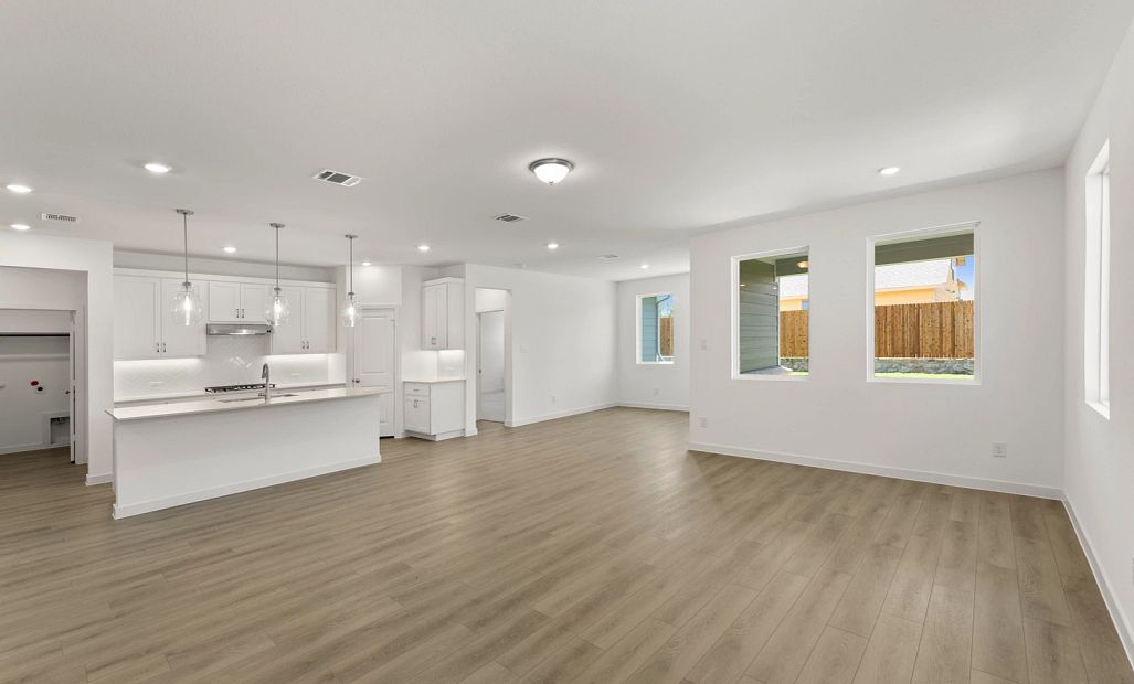 Open Kitchen-Living-Dining Room featuring the Timeless Collection