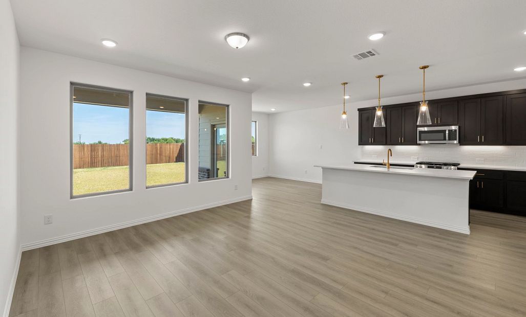 Open Kitchen-Living-Dining Room featuring the Oxford Collection
