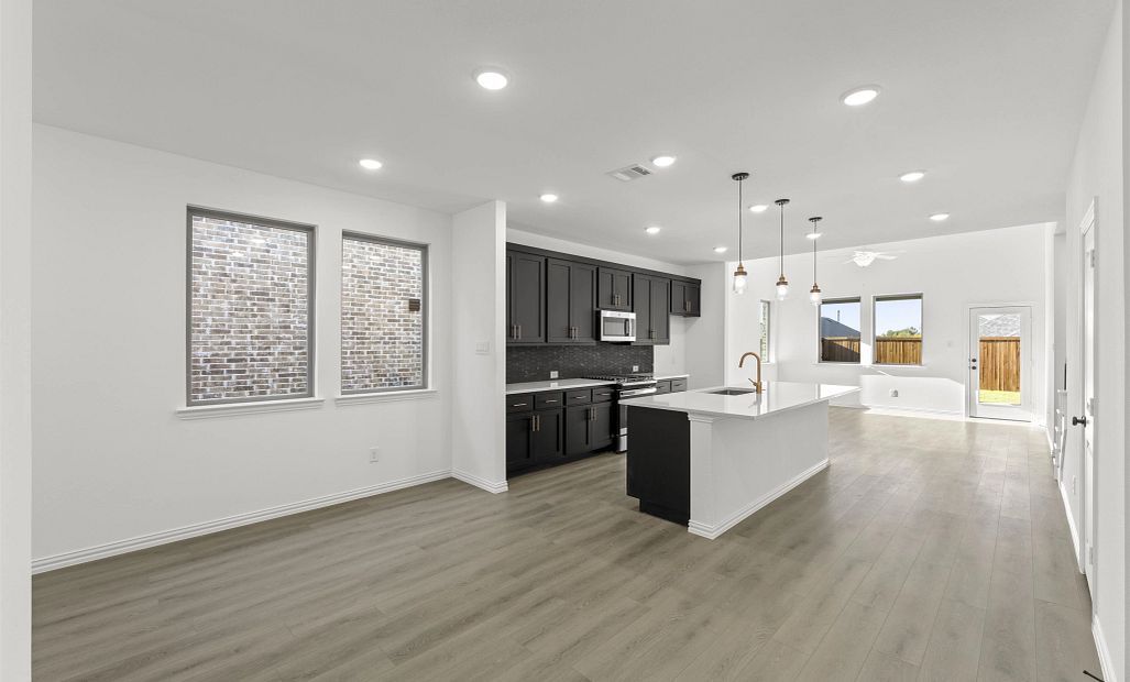 Open Kitchen-Living-Dining Room Representative Photo featuring the Noir Collection