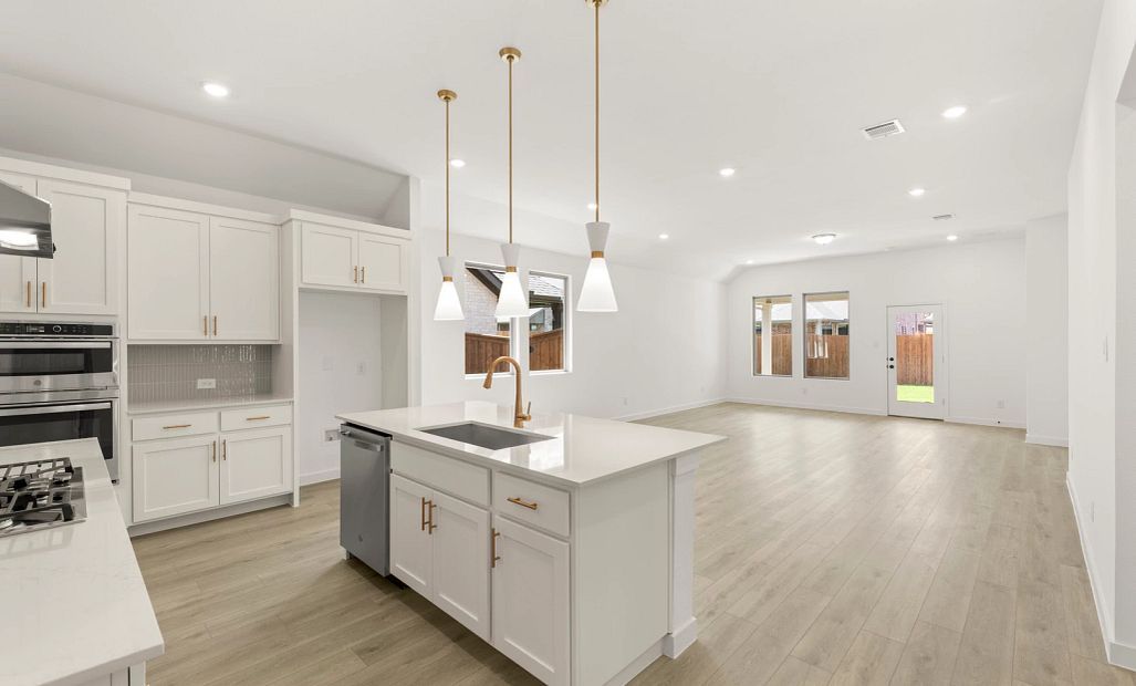 Open Kitchen-Living-Dining Room featuring the Serene Collection