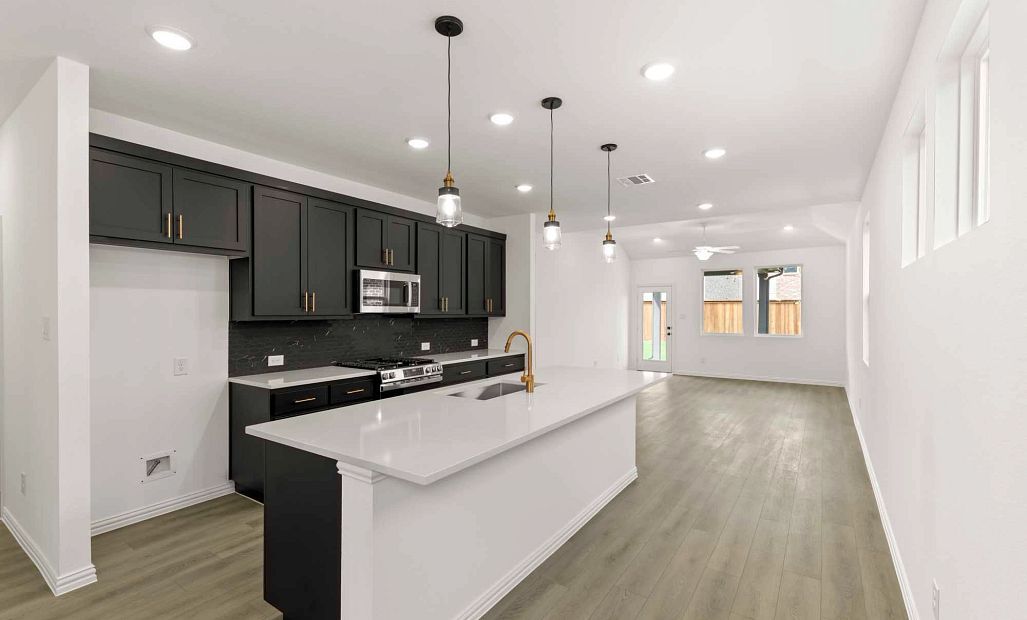 Open Kitchen-Living-Dining Room Representative Photo featuring the Noir Collection