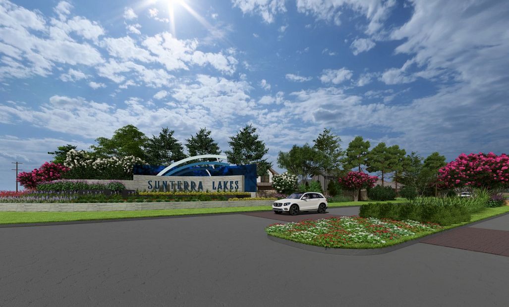 Sunterra Lakes monument and grand entrance showcasing the community’s resort-style lifestyle and