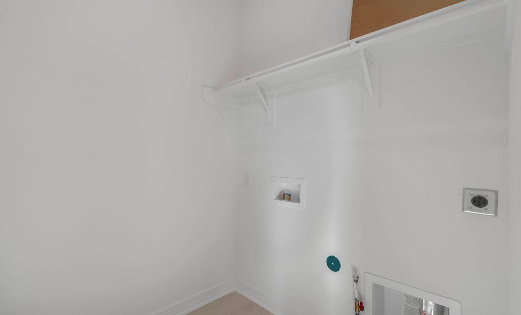 Utility room. Note: Sample product photo. Actual exterior and interior selections may vary by