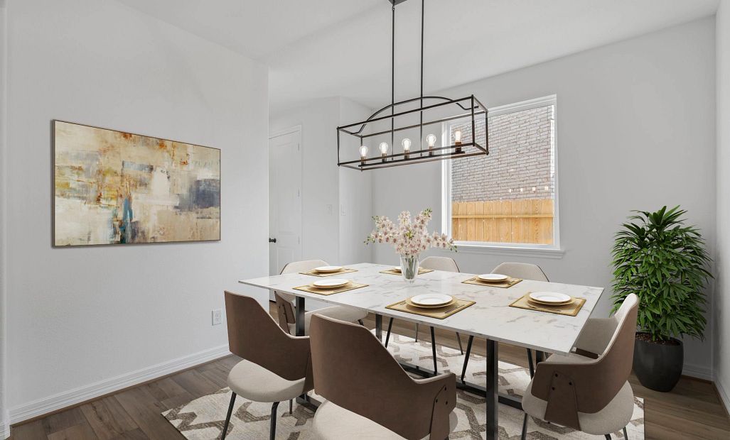 Formal dining room. Note: Sample product photo. Actual exterior and interior selections may vary by