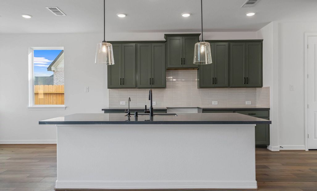 Kitchen. Note: Sample product photo. Actual exterior and interior selections may vary by homesite.