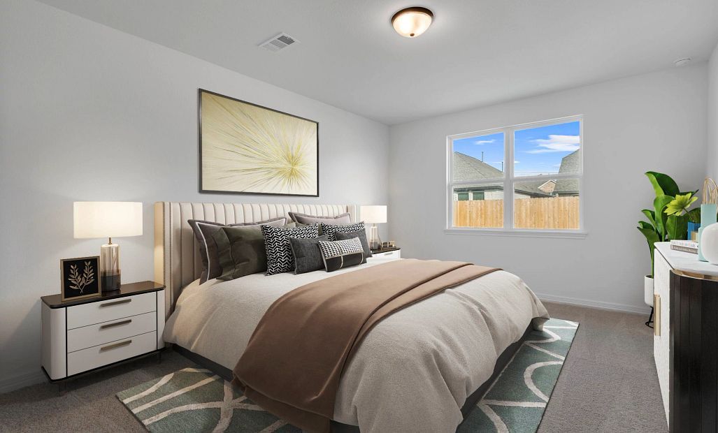 Primary bedroom. Note: Sample product photo. Actual exterior and interior selections may vary by