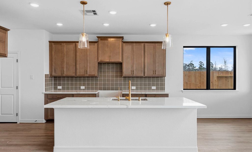 Kitchen. Sample product photo. Actual exterior and interior selections may vary by homesite. Photo