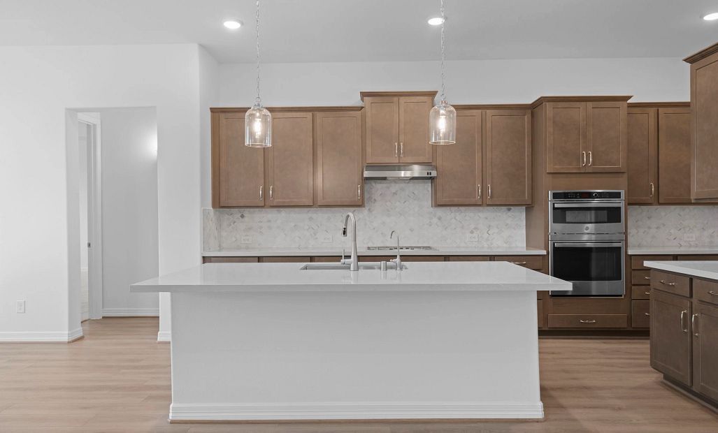 Kitchen. Note: Sample product photo - actual exterior and interior selections may vary by homesite
