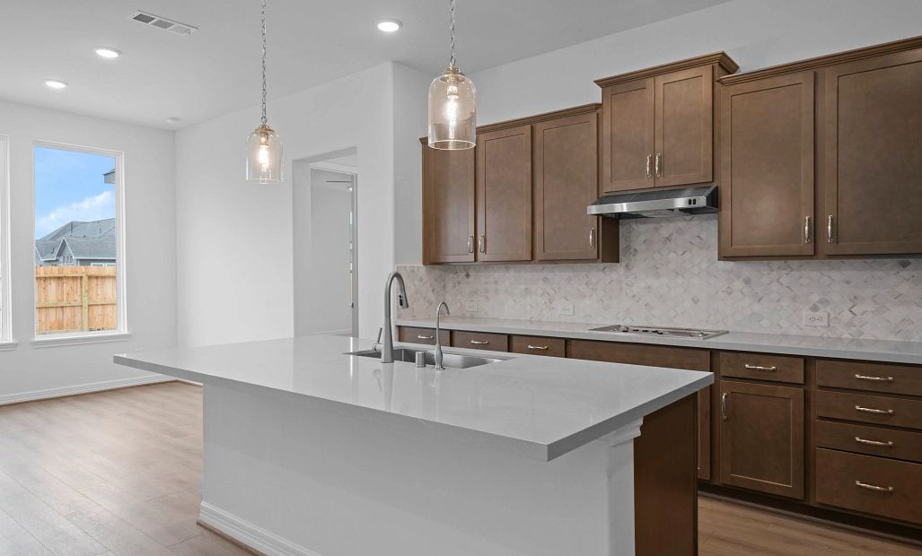 Kitchen and breakfast. Note: Sample product photo - actual exterior and interior selections may vary