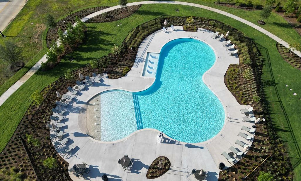 The pool serves as a central hub of excitement, where residents can relax, enjoy lively games, or