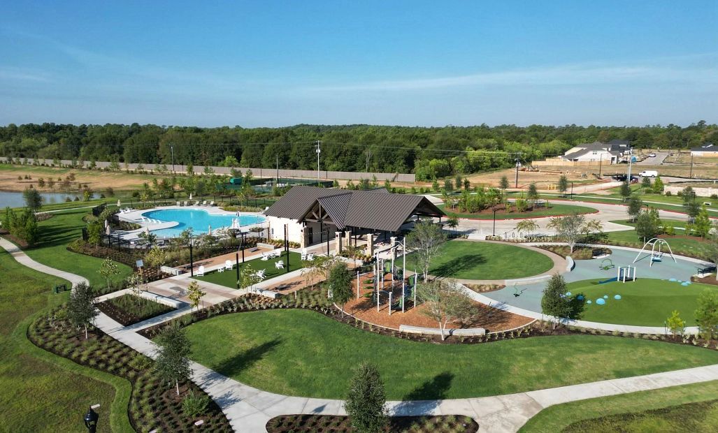 The playground and green spaces offer a vibrant setting where children can swing to new heights,