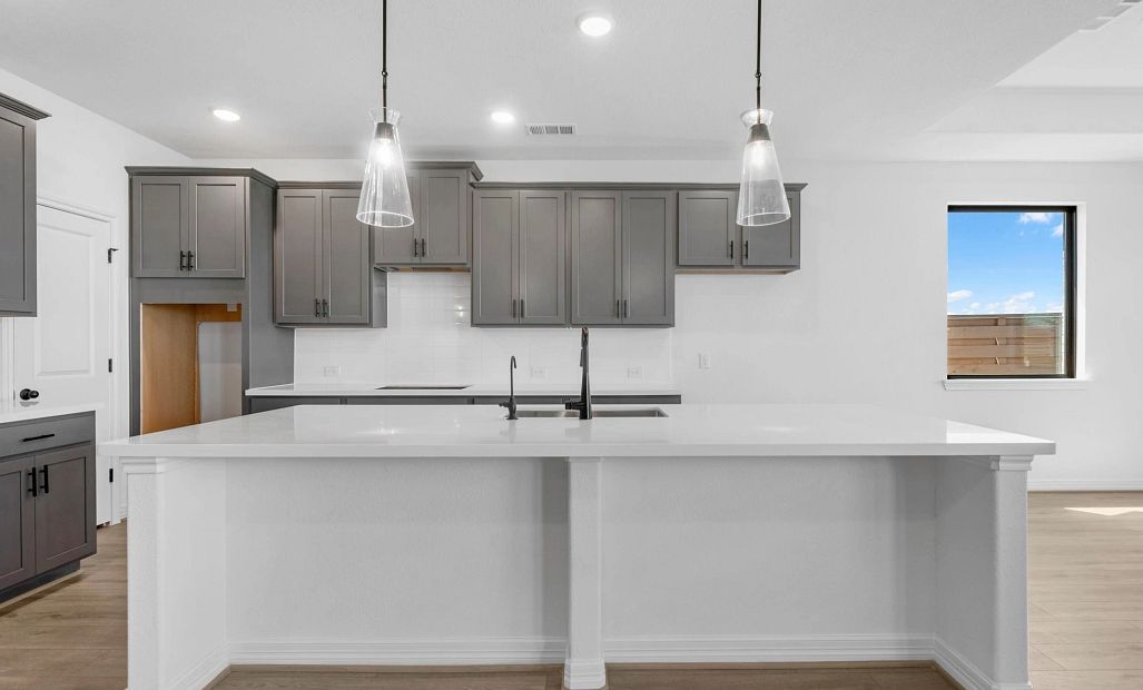 Kitchen. Sample product photo. Actual exterior and interior selections may vary by homesite. Photo