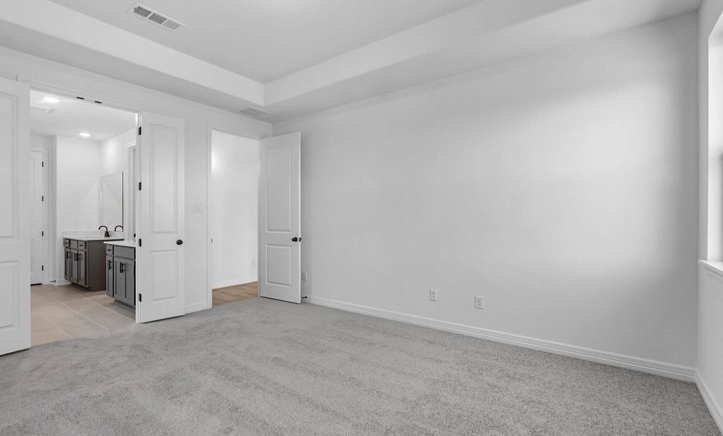 Primary Bedroom. Sample product photo. Actual exterior and interior selections may vary by homesite.