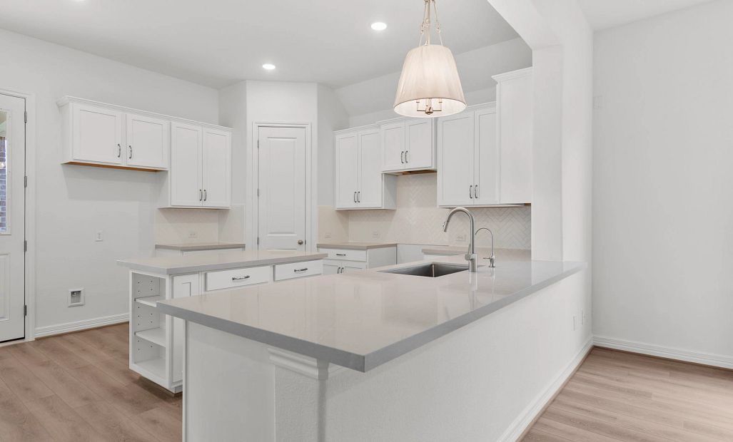 Kitchen. Sample product photo. Actual exterior and interior selections may vary by homesite. Photo