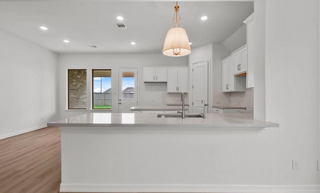 Kitchen.  Sample product photo. Actual exterior and interior selections may vary by homesite. Photo