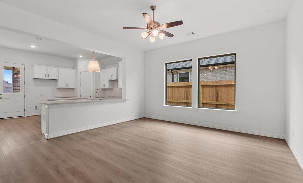 Gathering room.  Sample product photo. Actual exterior and interior selections may vary by homesite.