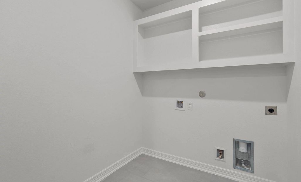 Laundry room.  Sample product photo. Actual exterior and interior selections may vary by homesite.