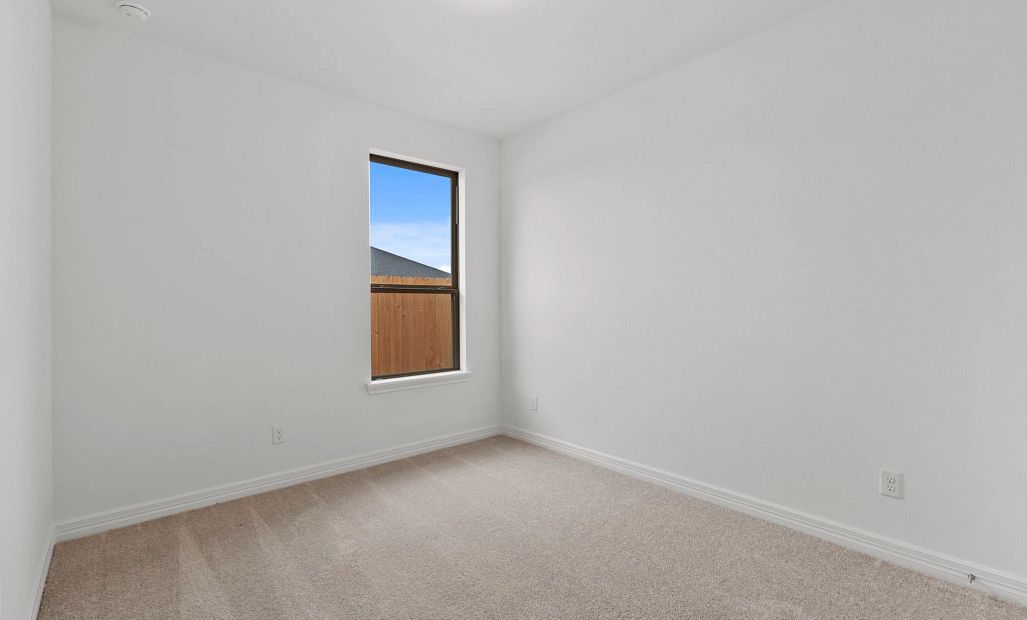 Secondary bedroom.  Sample product photo. Actual exterior and interior selections may vary by