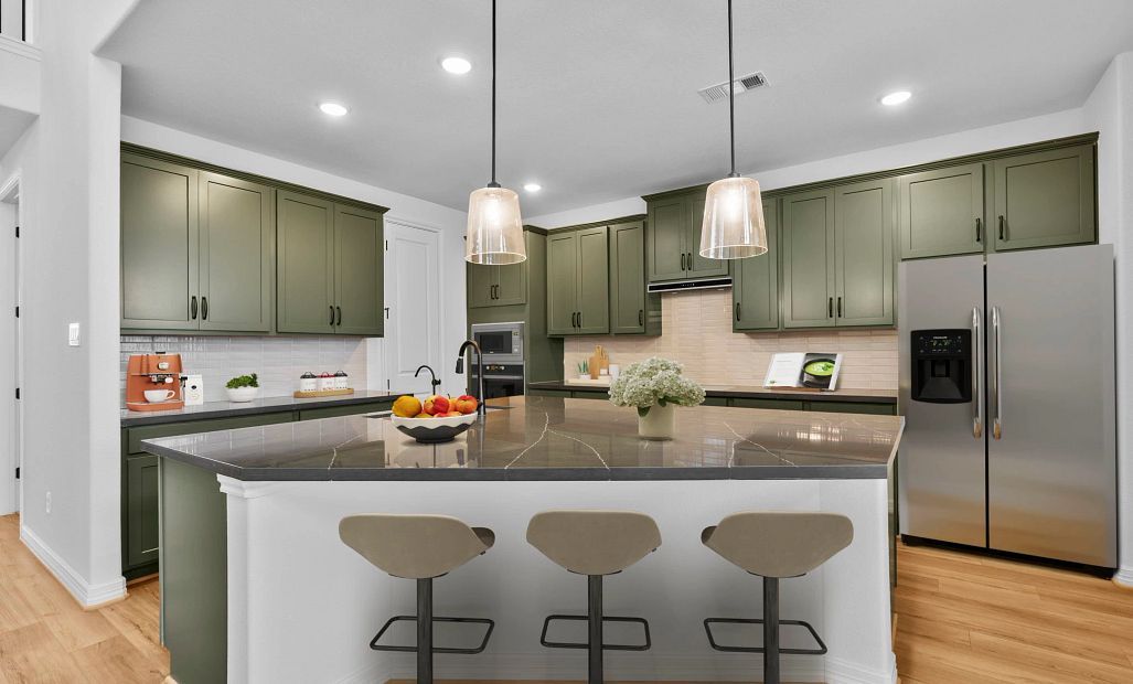 Design-forward kitchen with the AW Collection Rosemary, blending dramatic color and natural, neutral