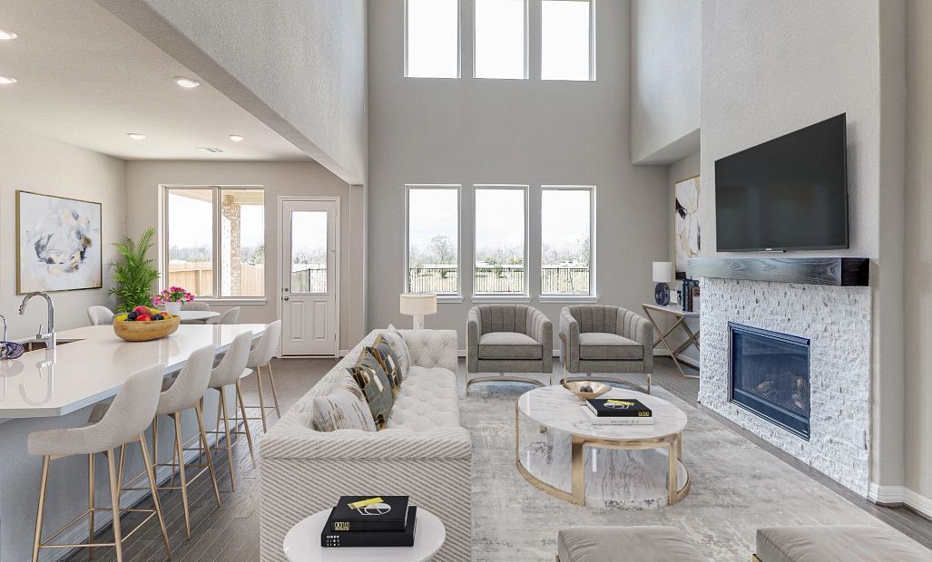 Two story family room. Note: Sample product photo - actual exterior and interior selections may vary