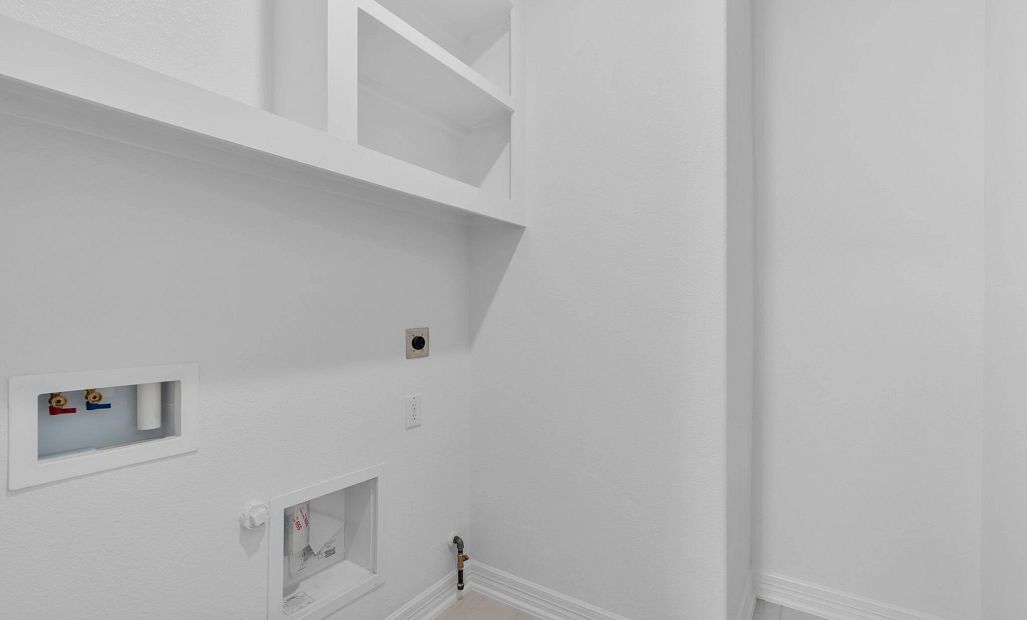 Functional utility room with custom shelSample product photo. Actual exterior and interior