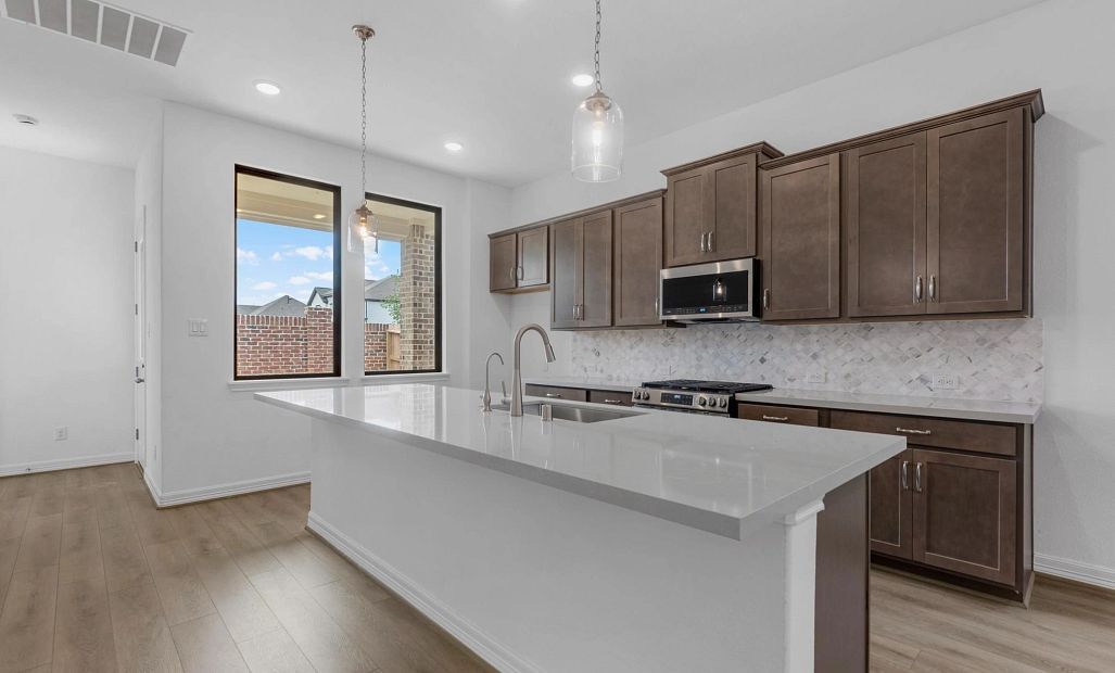 Kitchen. Sample product photo. Actual exterior and interior selections may vary by homesite. Photo