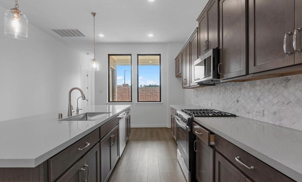Kitchen. Sample product photo. Actual exterior and interior selections may vary by homesite. Photo