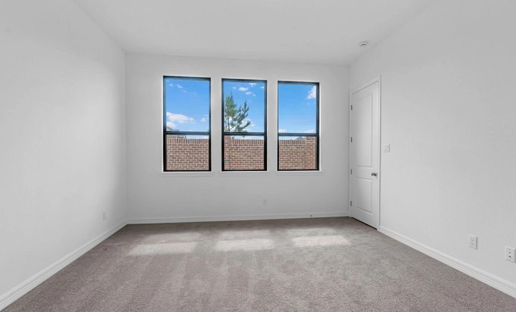 Primary bedroom. Sample product photo. Actual exterior and interior selections may vary by homesite.