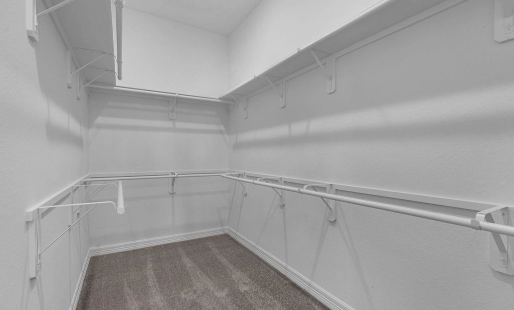 Primary Closet. Sample product photo. Actual exterior and interior selections may vary by homesite.