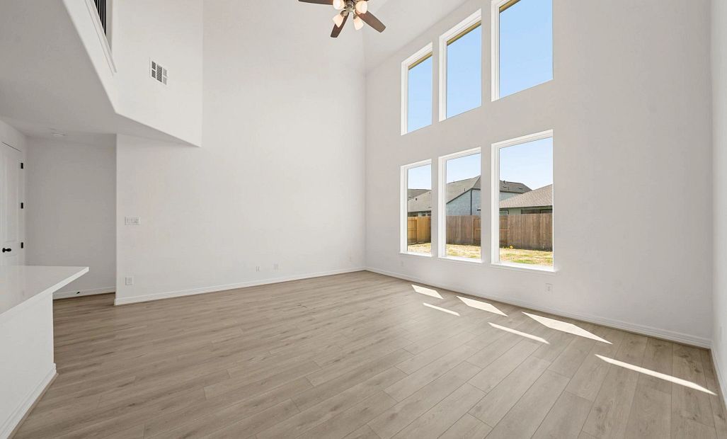 Gathering room. Sample product photo. Actual exterior and interior selections may vary by homesite.