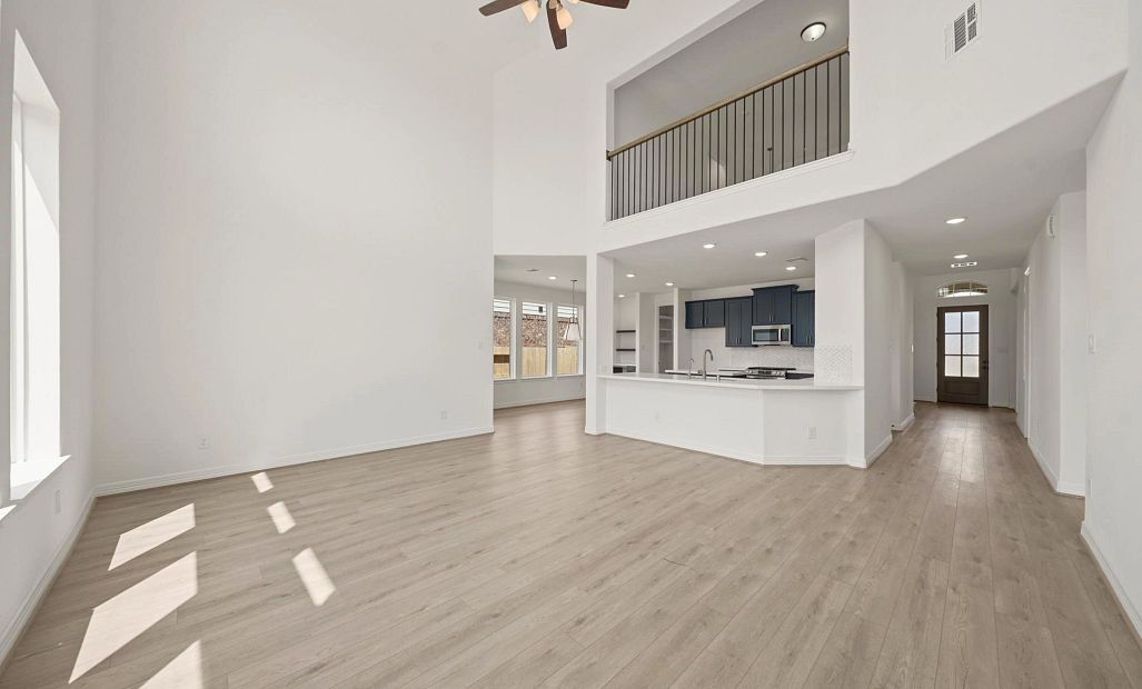 Gathering room. Sample product photo. Actual exterior and interior selections may vary by homesite.