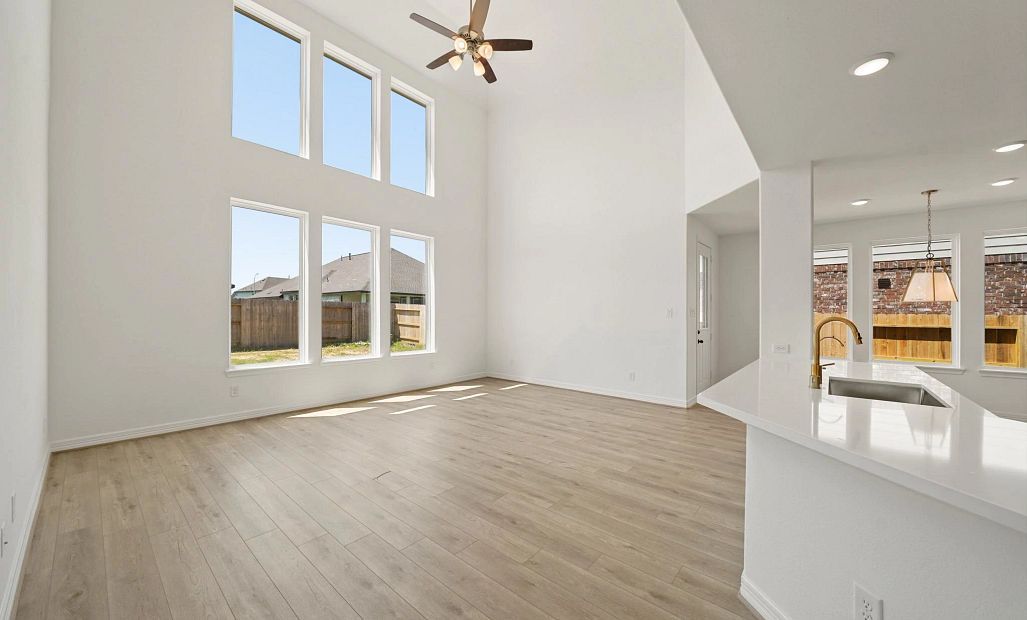 Gathering room. Sample product photo. Actual exterior and interior selections may vary by homesite.