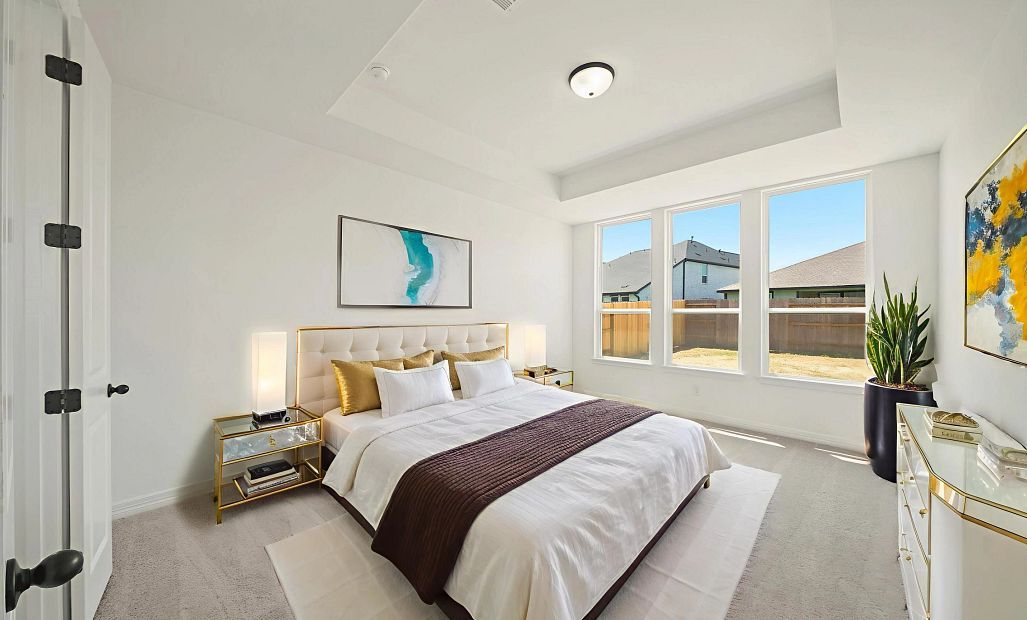 Primary bedroom. Sample product photo. Actual exterior and interior selections may vary by homesite.