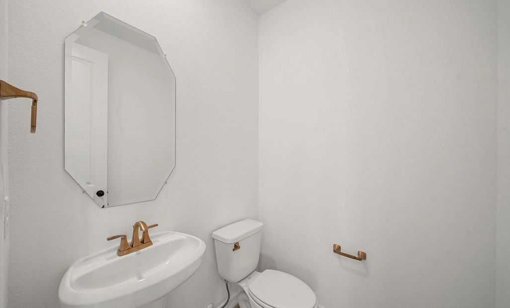 Powder bathroom. Sample product photo. Actual exterior and interior selections may vary by homesite.