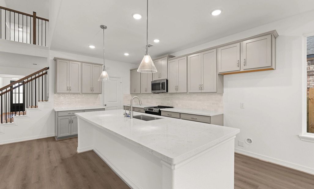 Kitchen. Sample product photo. Actual exterior and interior selections may vary by homesite. Photo