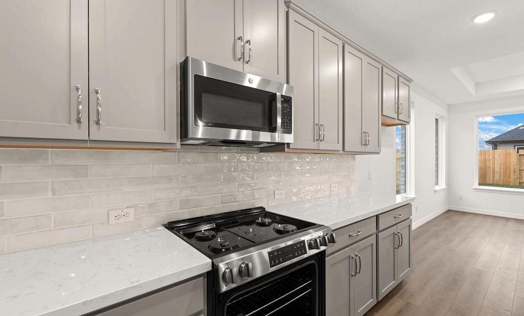 Kitchen. Sample product photo. Actual exterior and interior selections may vary by homesite. Photo