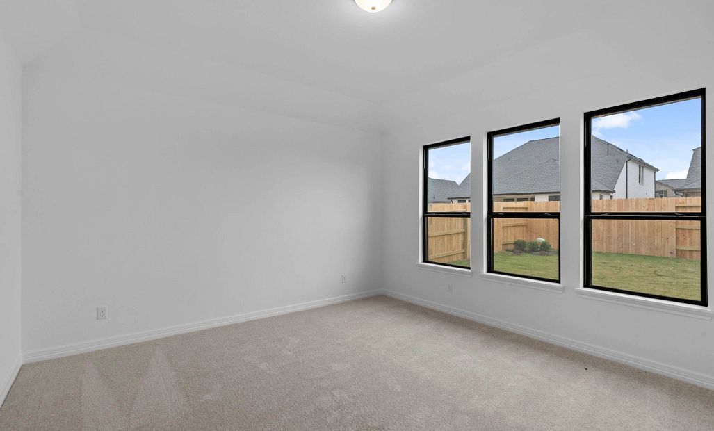 Primary bedroom. Sample product photo. Actual exterior and interior selections may vary by homesite.