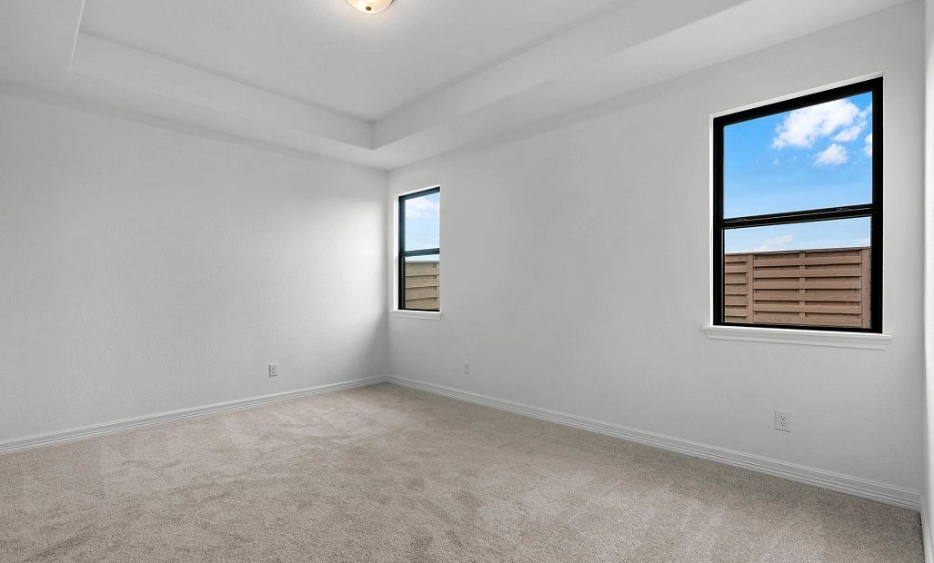 Primary bedroom. Sample product photo. Actual exterior and interior selections may vary by homesite.