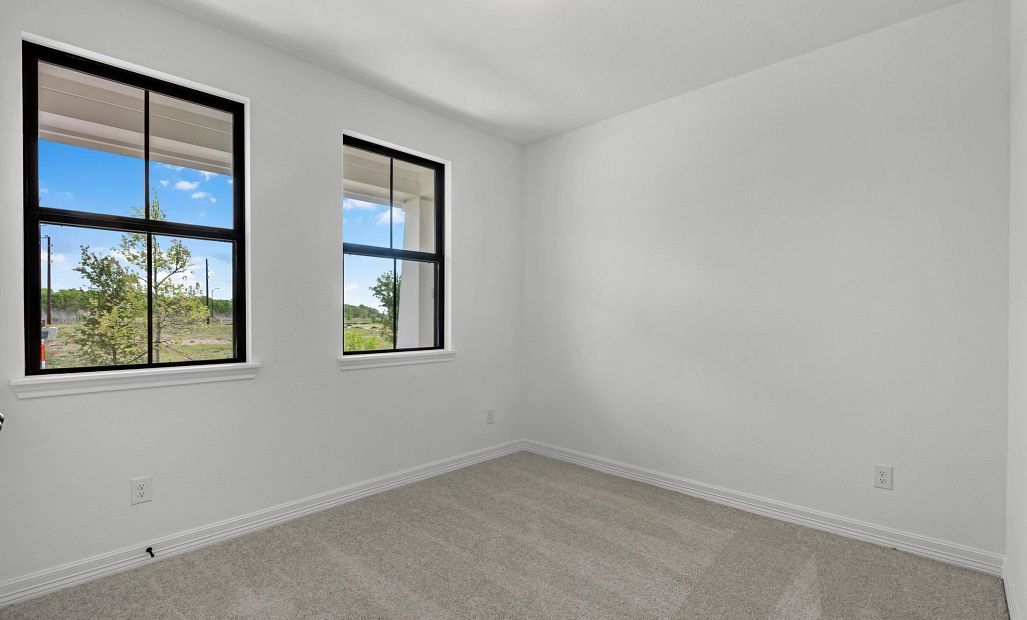 Secondary bedroom. Sample product photo. Actual exterior and interior selections may vary by