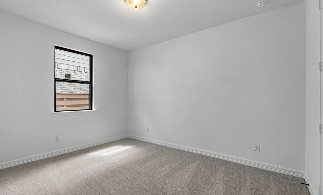Fourth bedroom. Sample product photo. Actual exterior and interior selections may vary by homesite.