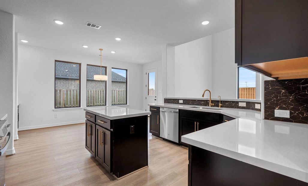 Kitchen. Sample product photo. Actual exterior and interior selections may vary by homesite. Photo