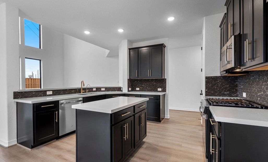Kitchen. Sample product photo. Actual exterior and interior selections may vary by homesite. Photo