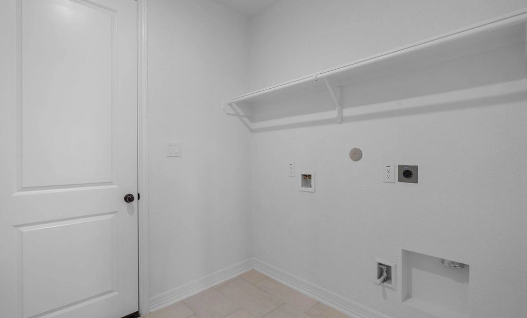 Laundry room. Sample product photo. Actual exterior and interior selections may vary by homesite.