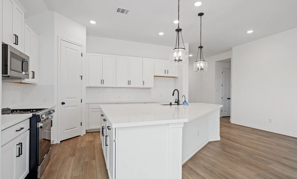 Kitchen. Sample product photo. Actual exterior and interior selections may vary by homesite. Photo