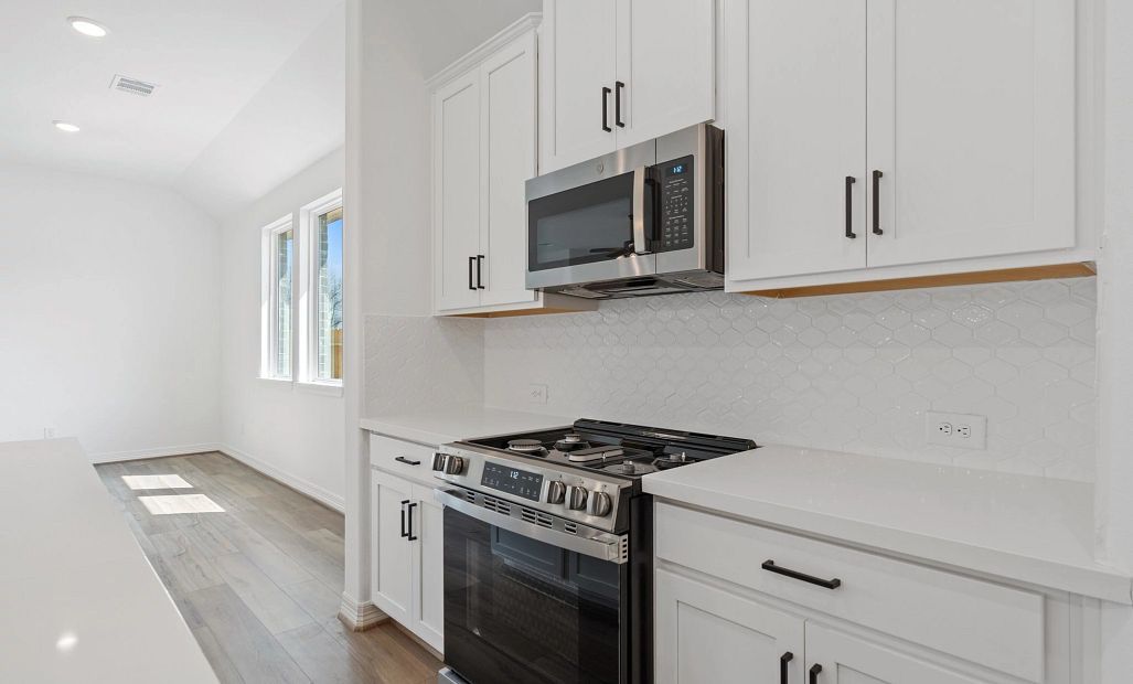 Kitchen. Sample product photo. Actual exterior and interior selections may vary by homesite. Photo