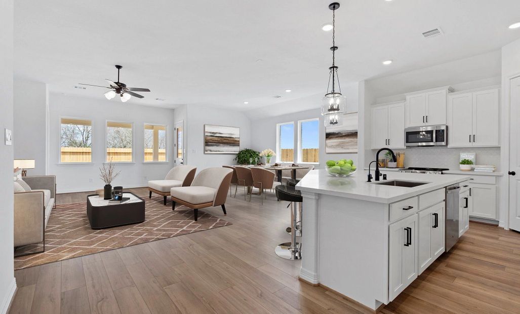 Kitchen and gathering room. Sample product photo. Actual exterior and interior selections may vary