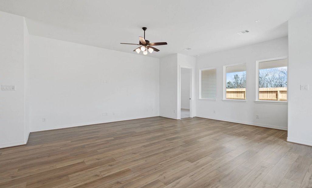 Gathering room. Sample product photo. Actual exterior and interior selections may vary by homesite.