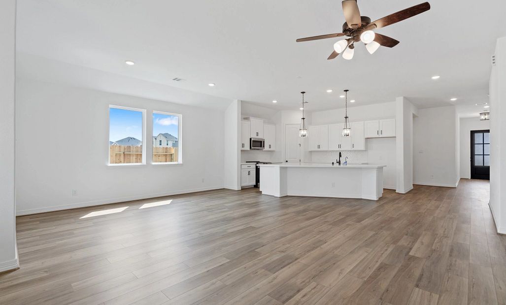 Gathering room. Sample product photo. Actual exterior and interior selections may vary by homesite.