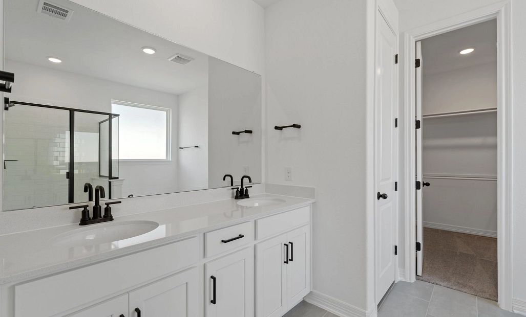 Primary bathroom.Sample product photo. Actual exterior and interior selections may vary by homesite.